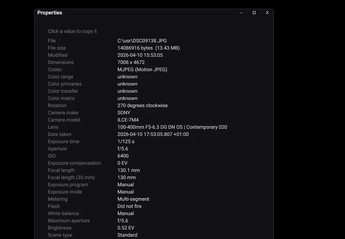 The properties panel with file details, camera, lens and exposure data